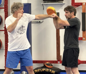 Men training self-defense at Empire Defense & Fitness in Albany NY