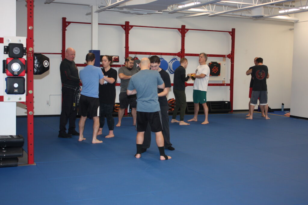 Adults practicing Empire Method self defense training at Empire Defense & Fitness in Albany NY