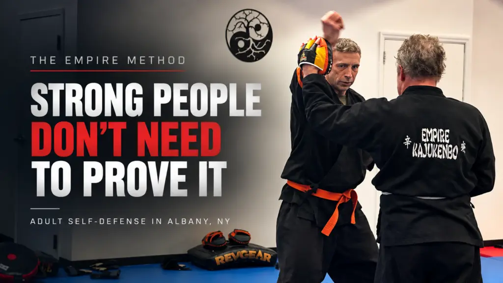 Adult self-defense students practicing controlled partner drills at Empire Defense & Fitness in Albany, NY.