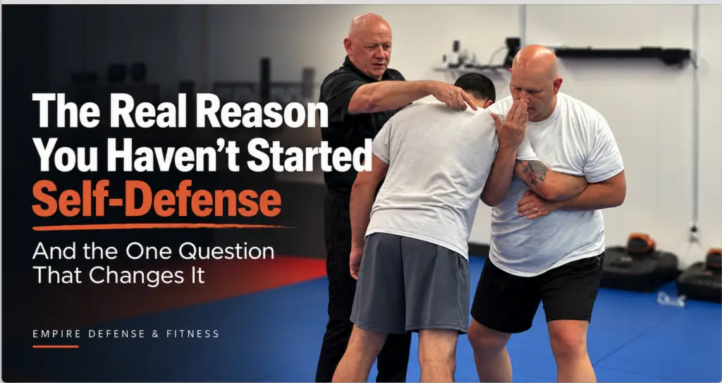 Adult beginner learning practical self-defense with an instructor at Empire Defense & Fitness in Albany, NY